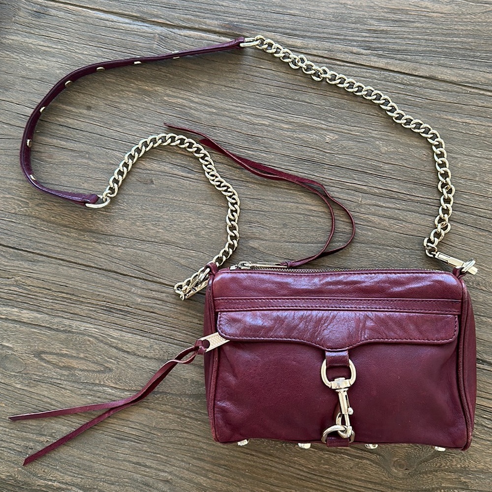 Rebecca Minkoff crossbody bag in burgundy.